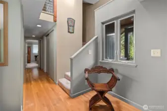 Hall leads to main level bedroom and bathroom.