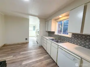 Kitchen and extra dining space.