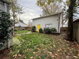 Fenced Backyard with Dog Run.