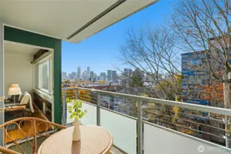Enjoy the sunset and downtown views from the balcony.