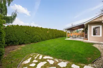 Private back yard with sprinkler system.