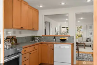 The kitchen pass allows the cooks to be part of the conversation.