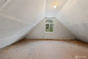 The unfinished area is thoughtfully divided into two separate sections with a door between them, creating natural zones that could one day become a private bedroom area, home office, studio, or additional flexible living space, while still serving as excellent storage in the meantime.