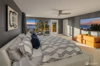 Quiet primary suite with blackout curtains and deck access to Sound views