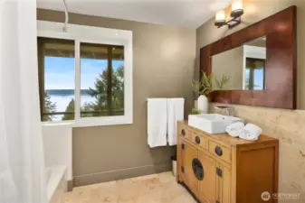 Enjoy heated bathroom floors paired with serene, view-filled surroundings.
