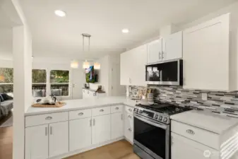 The kitchen is open to the living room and dining room.