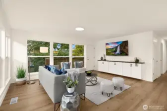 There's great natural light and views of mature trees in the living room.