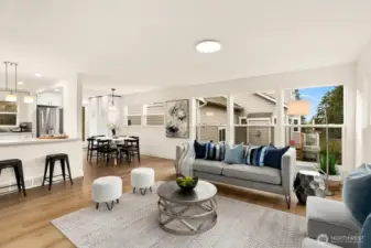 Another view of the living room looking towards the kitchen and dining area.