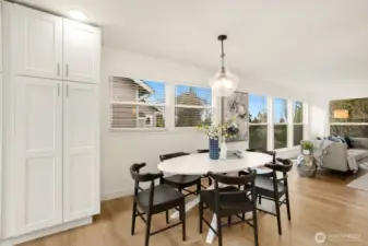 A close up of the dining space and pantry.