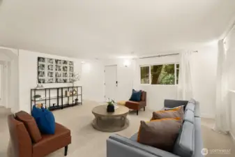 The lower level is a daylight basement, with a door out to the back patio.