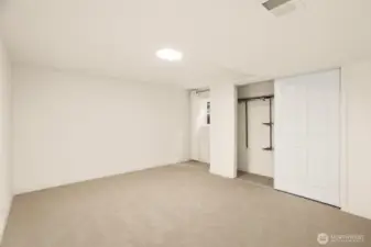 This is the 5th bedroom; it's also on the lower level. It's the largest bedroom in the house and could be used for an office, home gym, playroom, etc.