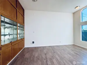 Built in lighted cabinets provides storage with function