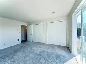 Second bedroom with it's own slider to the enclosed patio