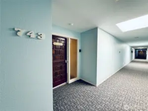 Inside entry to home, this condo has a keyed entry with intercom