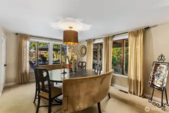Formal living & dining spaces w/large windows to capture the natural light & beauty of the outdoors.
