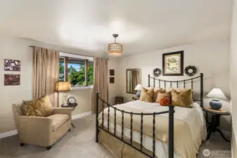 Large third bedroom w/ lake & garden views.