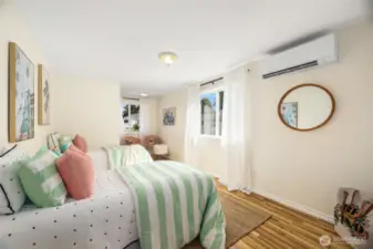 Upper level large bedroom with adjacent 1/2 bath