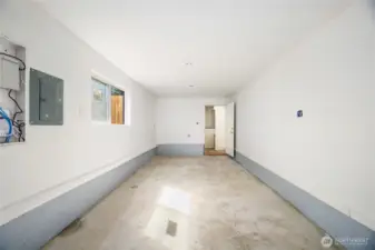 Lower level bonus room has washer/dryer hook up.  This space could be a workout room, shop or ???