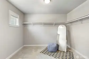 Large primary walk-in closet.