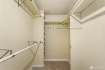 Walk in closet with lots of hanging space