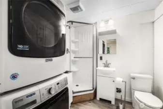 3/4 bath with single vanity  Stainless utility sink with spray wand & convertible clothes folding counter   Maytag washer & dryer