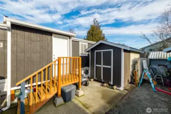 Parking with storage shed
