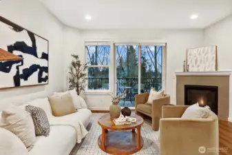 Cozy living room with gas fireplace and walk-out covered deck
