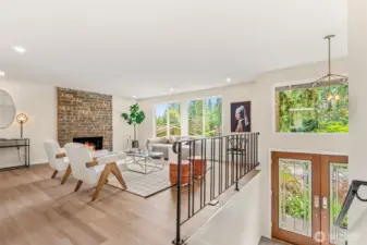 Welcome home to the formal living room, w/ a wood burning fireplace