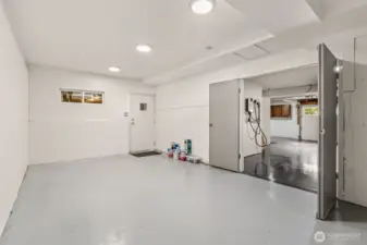 XL garage w/ EV charger and this extra BONUS room that has so many uses!