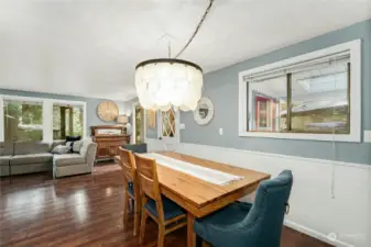 Formal dining area with 8 person table
