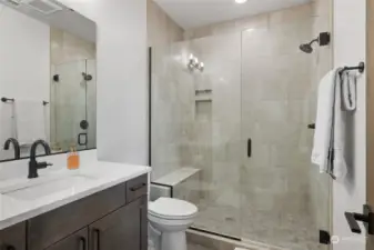 Upstairs primary bathroom with roomy walk-in shower