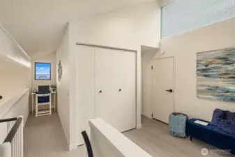 Loft Looking Towards View Alcove, Storage Room to Right & 3/4 bath
