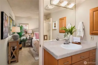 Primary three quarter bath that balances comfort and style.