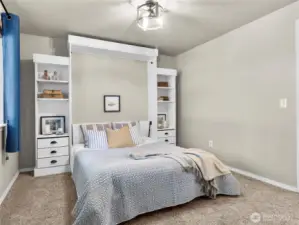 Versatile second bedroom—perfect for guests, a home office, or creative space. With custom built-in Murphy bed- maximizing space!