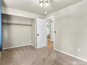 Wide closet with great storage and organization potential.