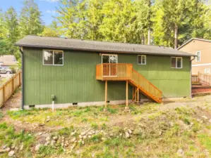 Private backyard retreat with plenty of space for gatherings or play.