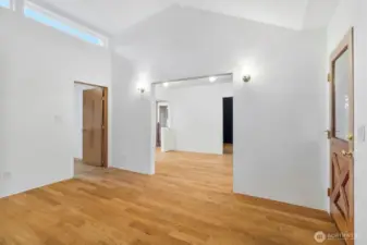 Spacious living area with open flow to dining and kitchen