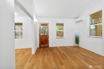 Open-concept living space with abundant natural light