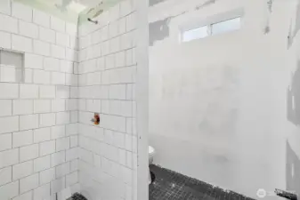 Unfinished bathroom in the detached garage ADU