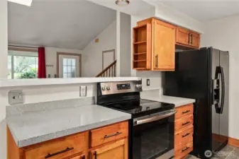 Lighted kitchen bar counter keeps the conversations flowing