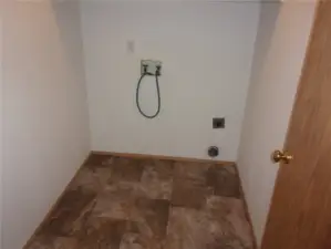 Separate Laundry Room.