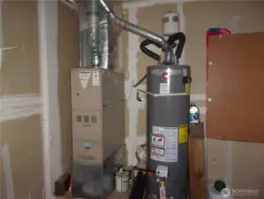 Furnace and water heater in the garage.