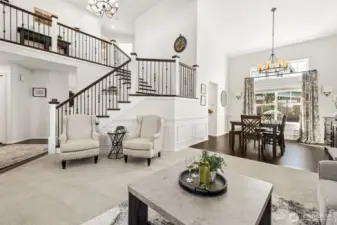 Seamless flow between living and dining areas, with soaring ceilings and elevated touches creating an inviting space for everyday living and entertaining.