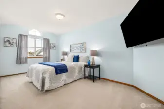 Two of the three additional bedrooms.