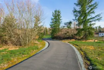 Entry drive - barndominium is barely visible