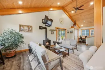 Living room showing slider to deck and office space