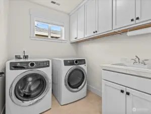 upstairs laundry is conveniently right where you need it!