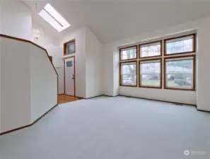 Entry with Vaulted Ceilings and Skylights