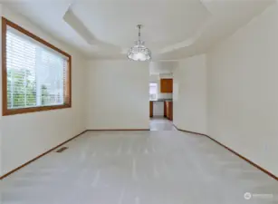 Dining Room Features a Coffered Ceiling