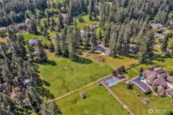 Drone shot Looking S W. Property is at center of the picture